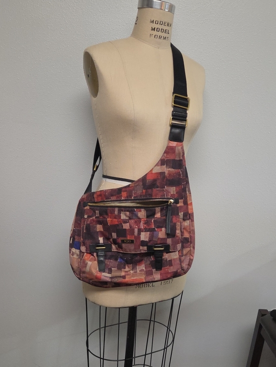 Tumi Handbags - Tumi Multicolor Patchwork Crossbody Bag with Black Strap